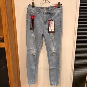 Distressed blue jeans